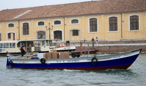 Delivery boat Venice Italy
