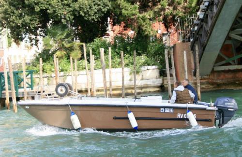 Delivery boat Venice Italy