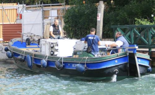 Delivery boat Venice Italy